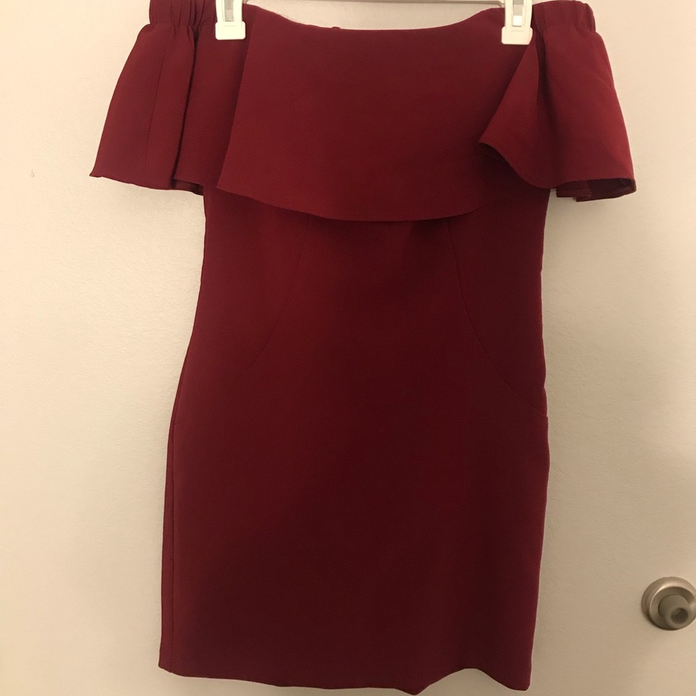 Maroon form fitting strapless dress